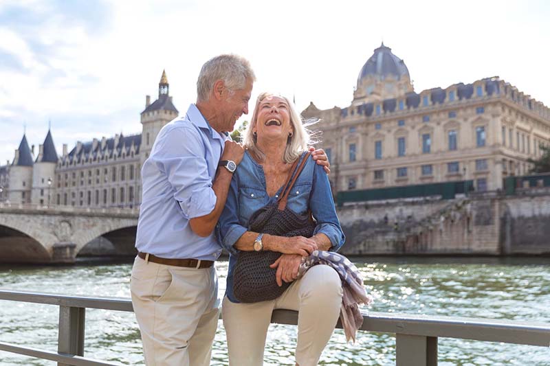 Couple meeting with financial advisor discuss how to choose a trustee.